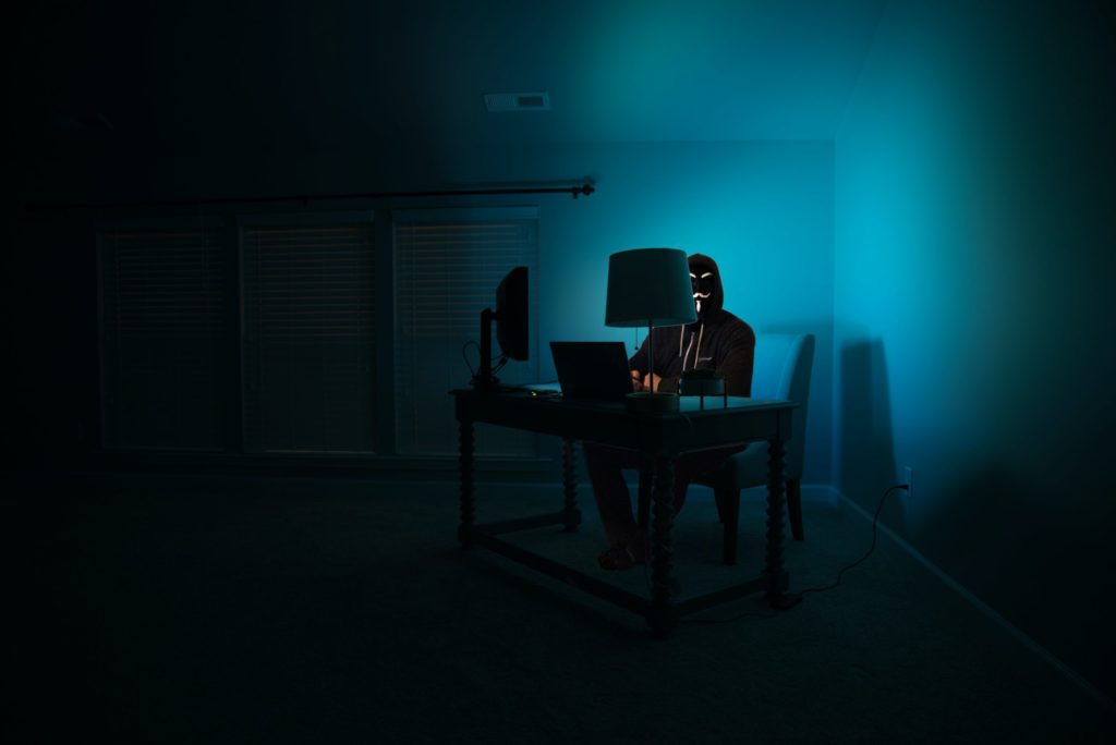 Hacker working in the dark